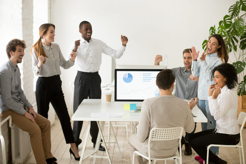 A group of employees celebrating