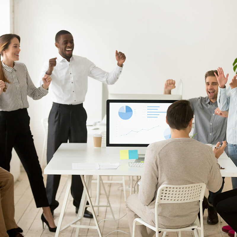 A group of employees celebrating